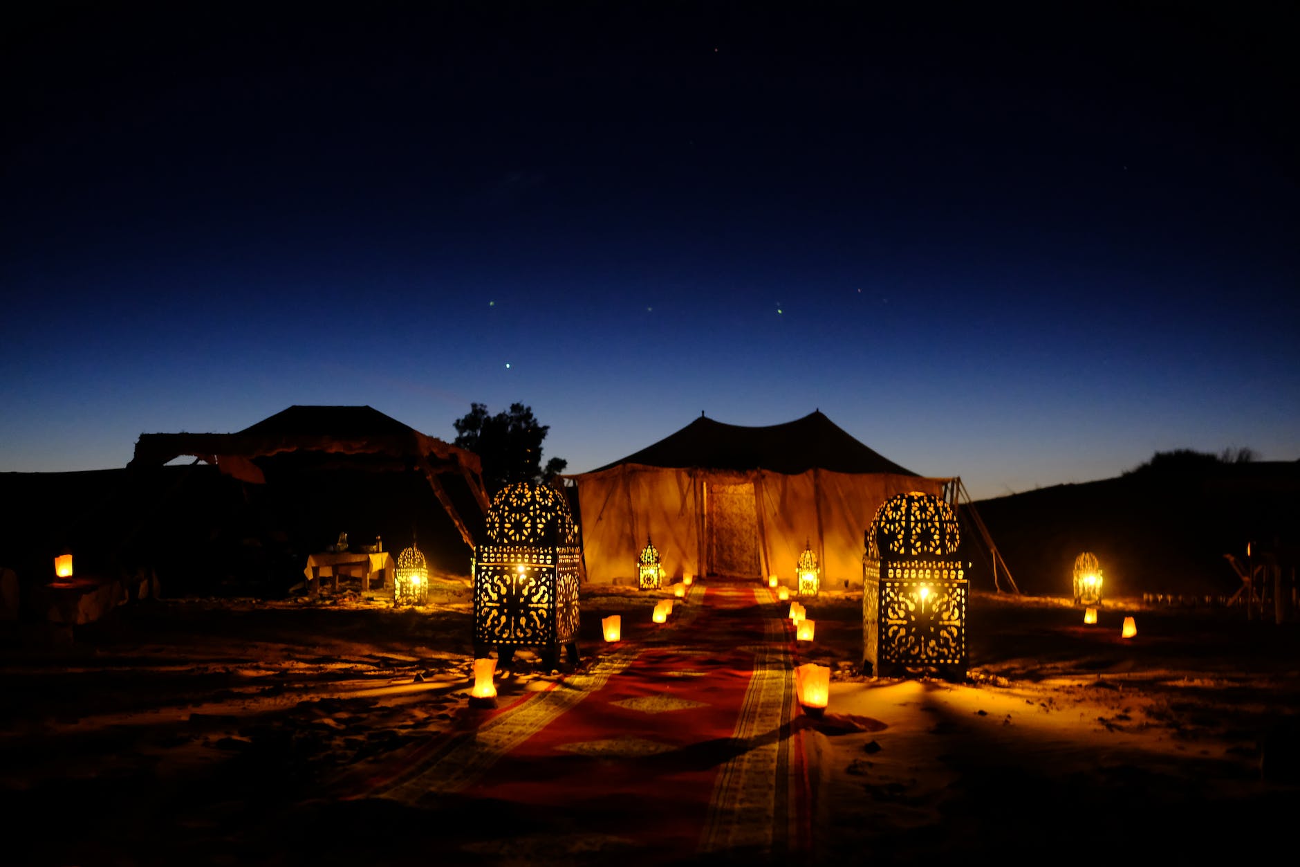 brown canopy tent with yellow lights